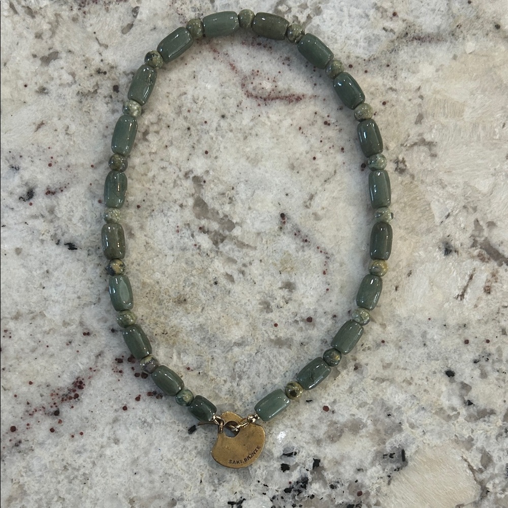 Suki Bronze Green Beaded Necklace with Bronze Hammered Pendant